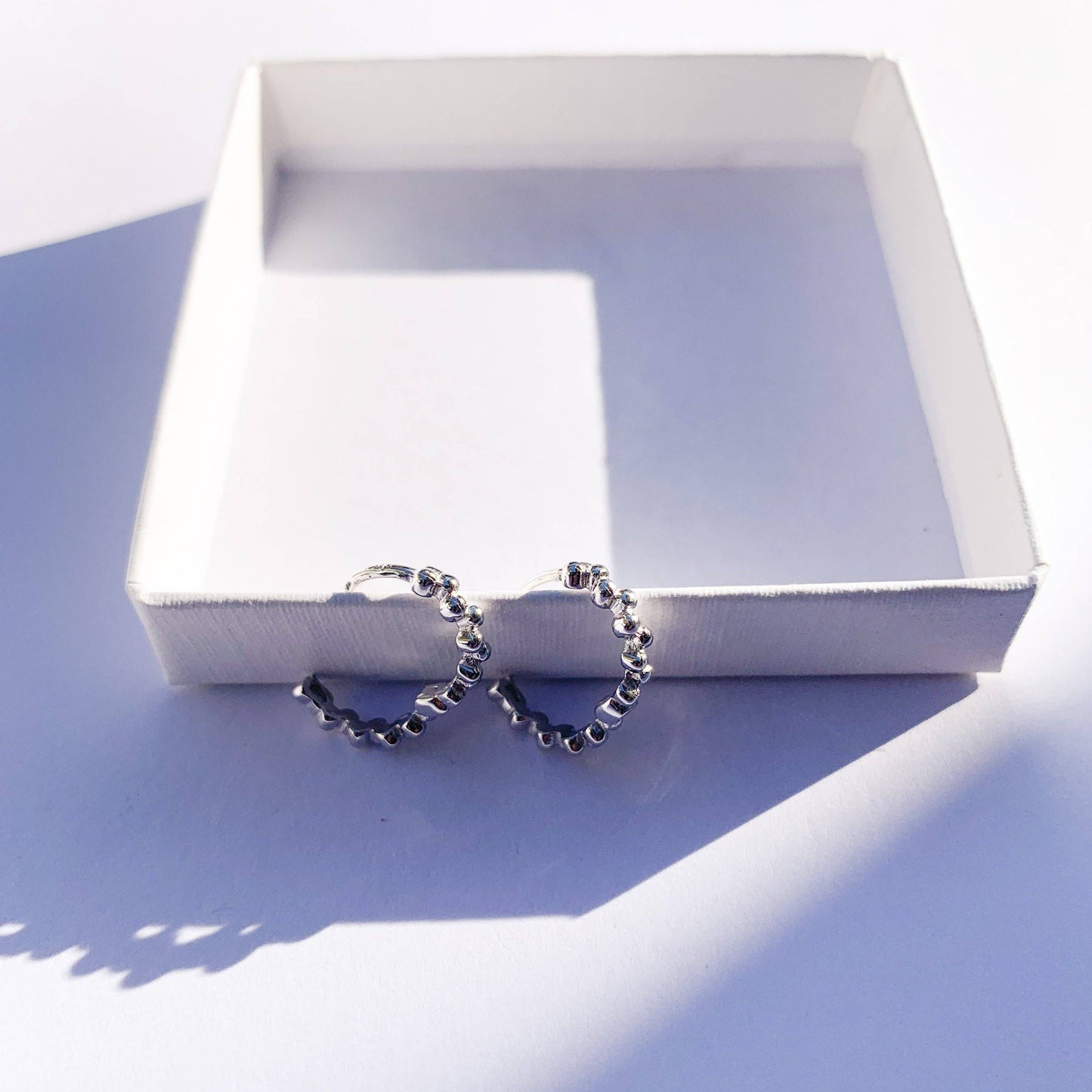 Kruhové naušnice Nala - stříbrné